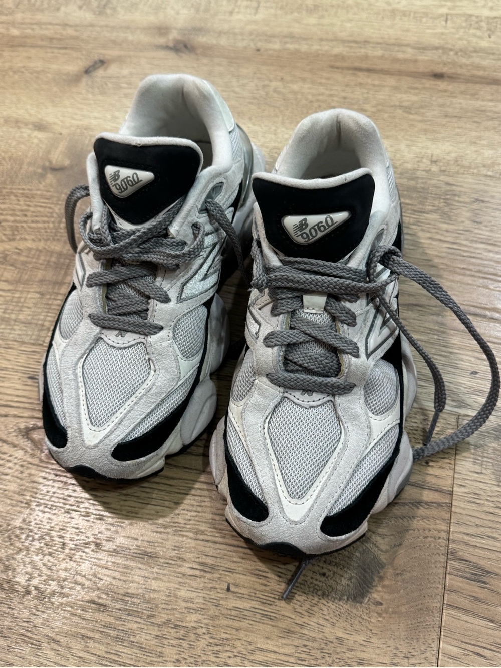 New Balance 9060 sneakers in the Reflection/Black (or "Oreo") colorway.